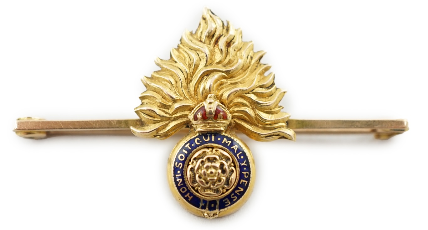 An Edwardian 18ct gold and two colour enamel Royal London Fusiliers sweethearts brooch